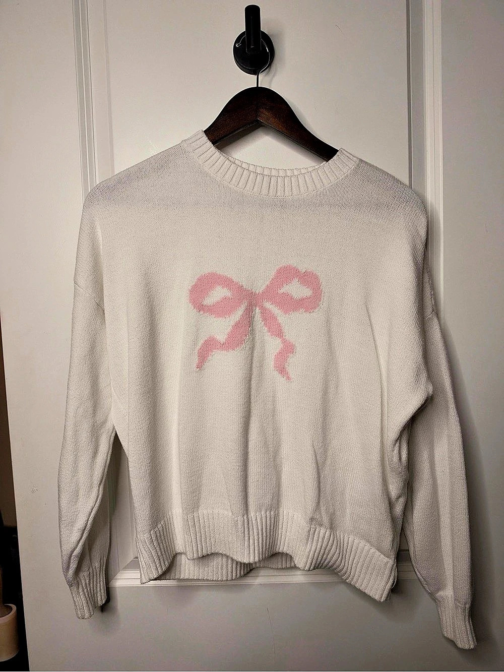 Hollister White and Pink Bow Sweater 
- Size Small